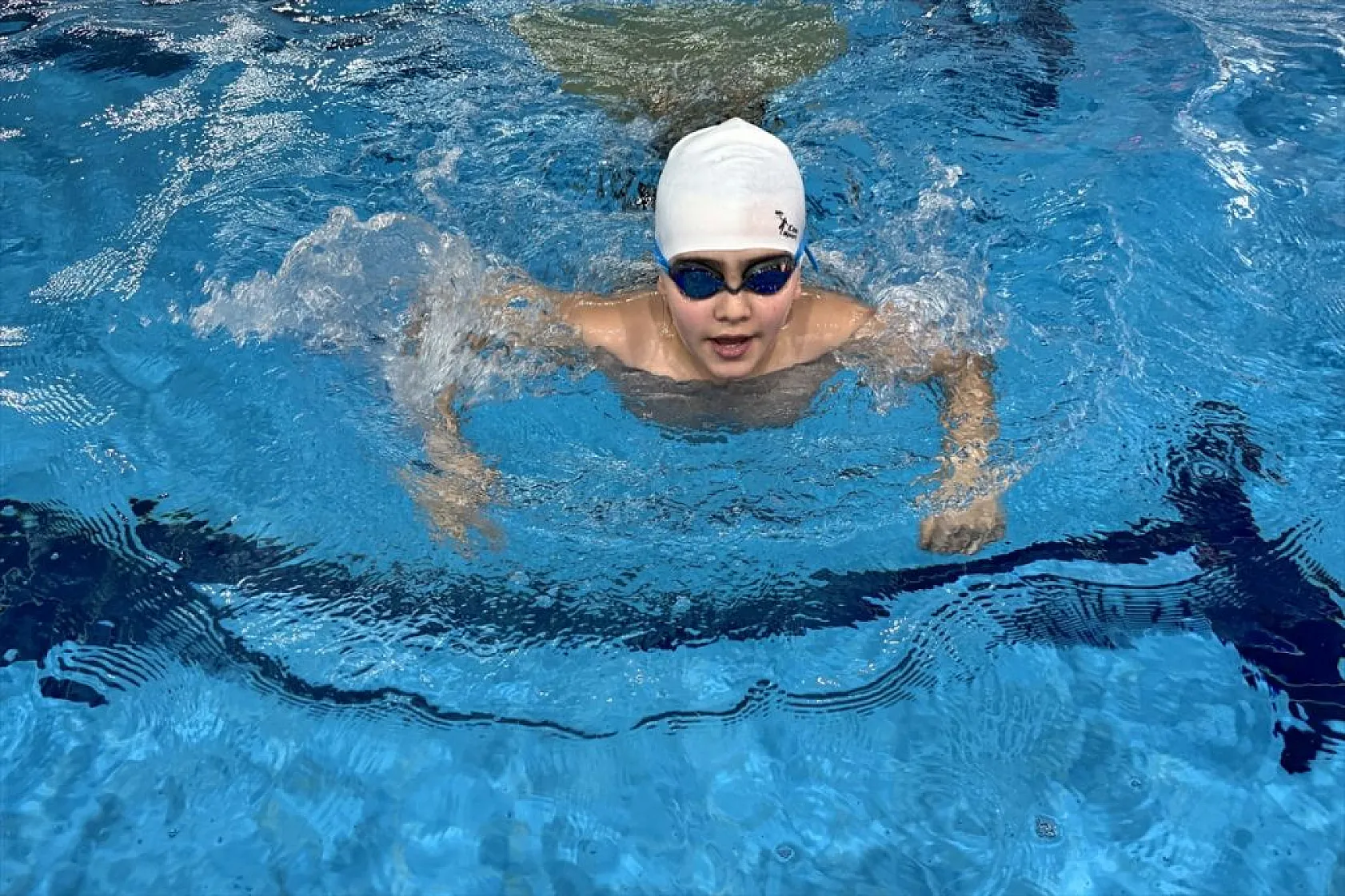 Su korkusunu yendi, şampiyon oldu