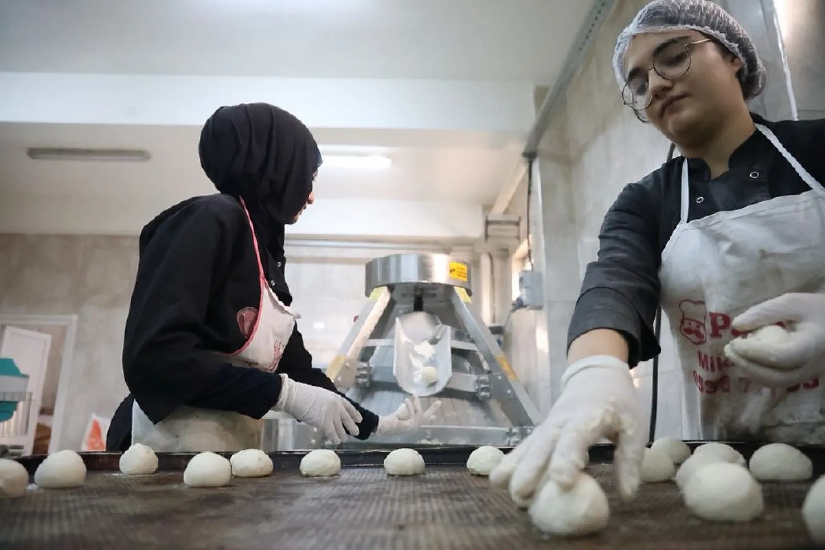 Hem eğitim hem üretim