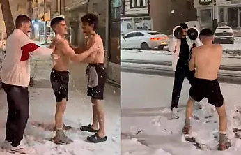 Yağan kar altında, sıcak antrenman