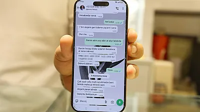 Komik rakam dolandırıcıyı ele verdi