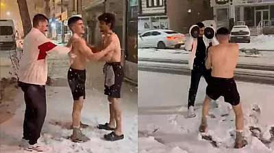 Yağan kar altında, sıcak antrenman