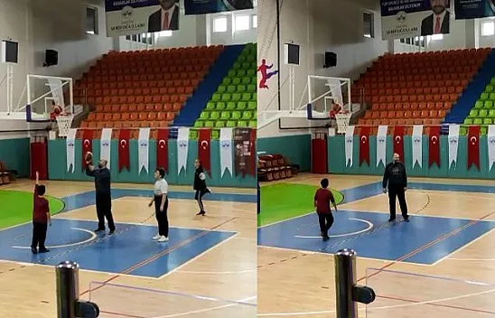 Minik basketbolcunun attığı top, potada 'asılı' kaldı
