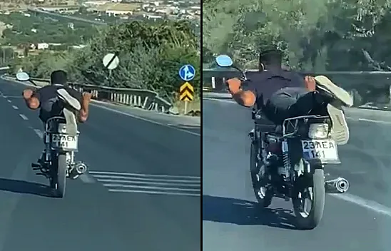 Motosikleti yatarak sürdü!