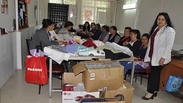 Halk Eğitim Kursuna nakış ve kumaş desteği
